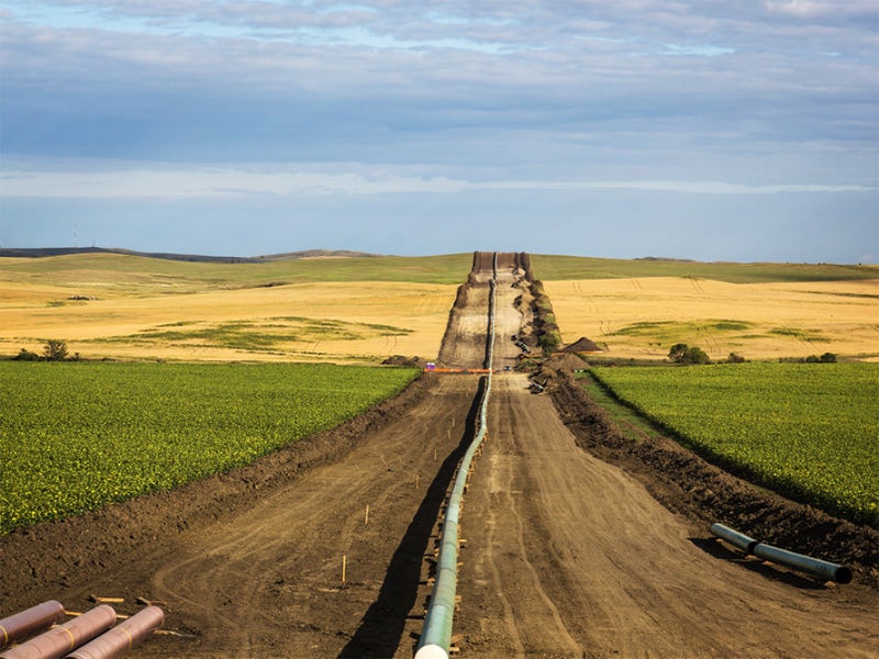 The DAPL (Dakota Access Pipeline) being installed between farms, as seen from 50th Avenue in New Salem, North Dakota.