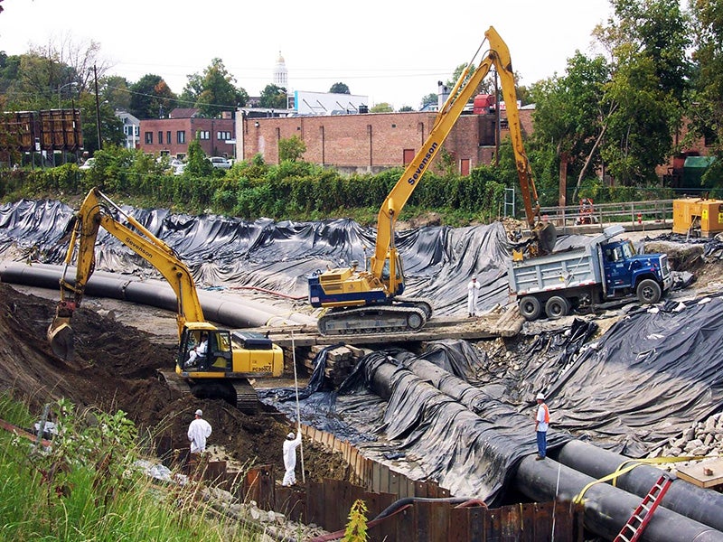 Contractors work on the GE Housatonic Superfund project in Massachusetts. Contractors work on the GE Housatonic Superfund project in Massachusetts.