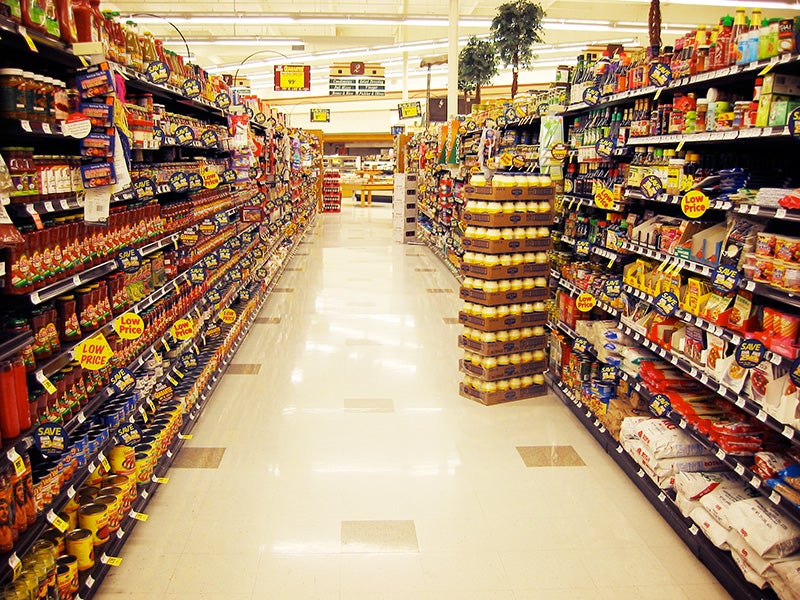 A supermarket aisle. A supermarket aisle.