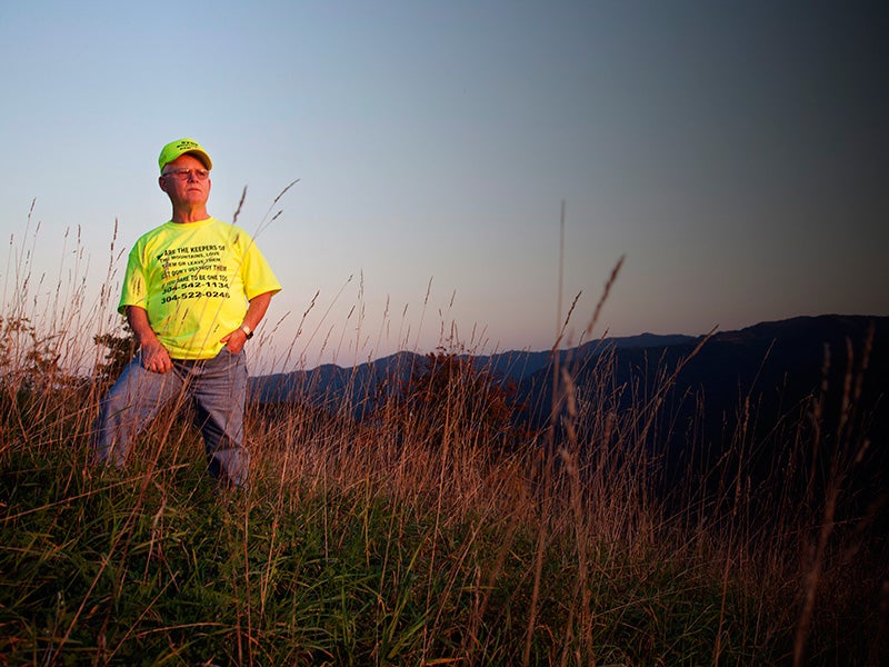 Larry Gibson, watching the sun set over a decimated Kayford Mountain.