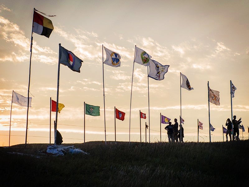 Flags fly at the Sacred Stone Camp, Cannonball, North Dakota.