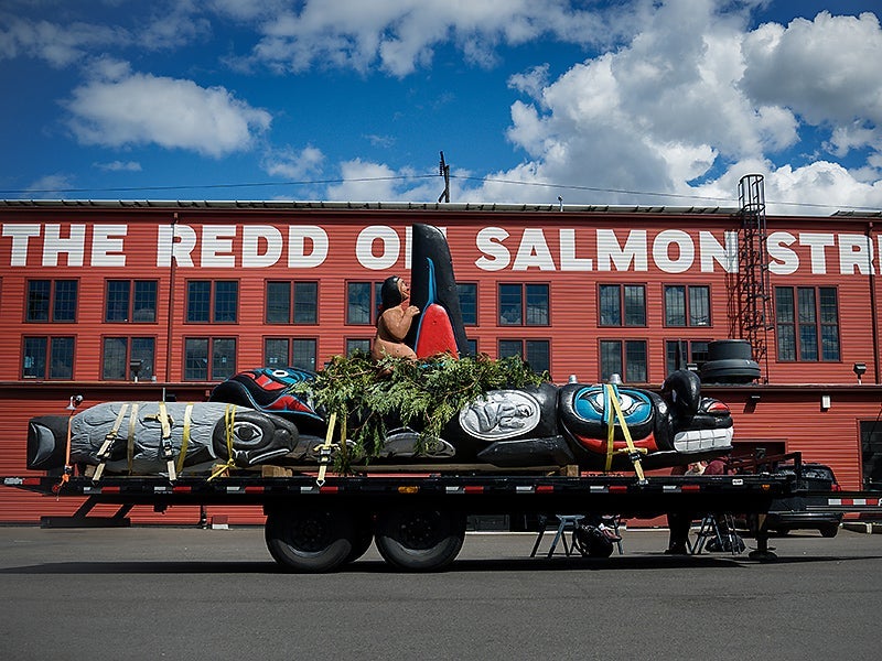 A totem pole on display during the Spirit of the Waters totem pole journey in Portland, Oregon, on May 10, 2022.