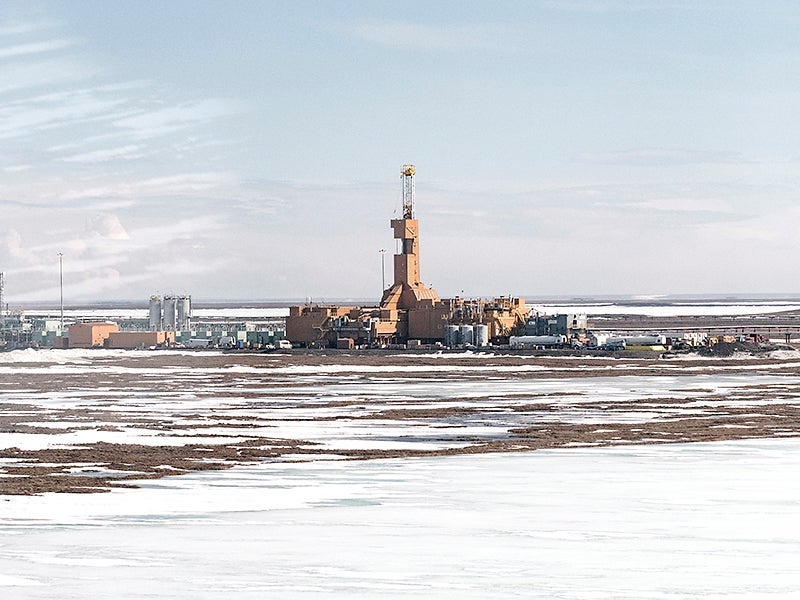 An oil drilling site in the Western Arctic. A photograph of a drilling site in the Western Arctic. The now paused Peregrine oil drilling project would have been in this region, releasing a carbon bomb.