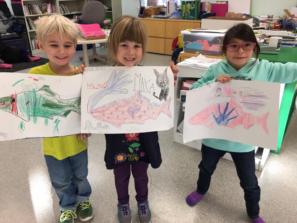Students at Ya Ne Dah Ah School, the only school in Alaska owned and operated by an Alaska Native tribe, display drawings of salmon. Members of the Chickaloon Native Village worry about the school's fate if the Usibelli Mining Company moves forward with a