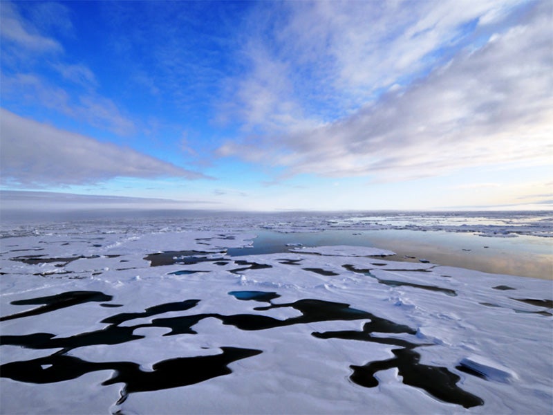 Clouds begin to thin over the Arctic Ocean, Aug. 19, 2009. Clouds begin to thin over the Arctic Ocean, Aug. 19, 2009.