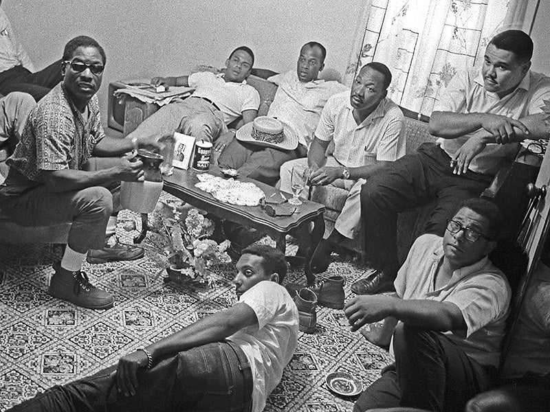 A meeting during the Meredith March Against Fear in Greenwood, Mississippi in June 1966. Pictured, clockwise from left, are Bernard Lee, Andrew Young, Robert Greene, Martin Luther King Jr., Lawrence Guyot, Harry Bowie, and Stokely Carmichael. 