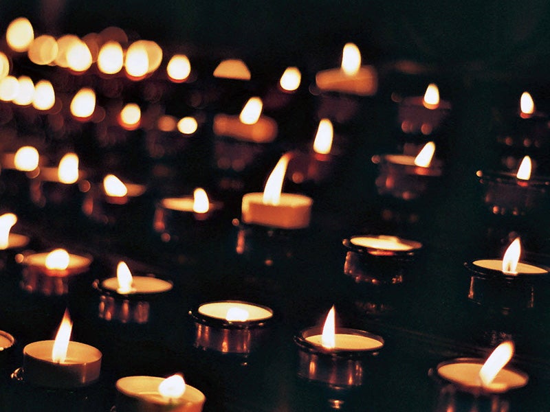 Candles lit for remembrance. Candles lit for remembrance.