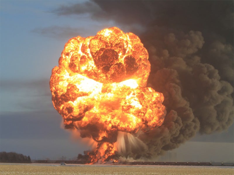 Fire from petroleum crude oil tank car explosion.