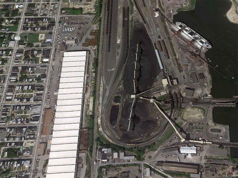 The CSX coal export and processing facility in Baltimore, MD. Neighboring communities already suffer from air and noise pollution generated by the rail traffic and facility operations. The CSX coal export and processing facility in Baltimore, MD. Neighboring communities already suffer from air and noise pollution generated by the rail traffic and facility operations.
