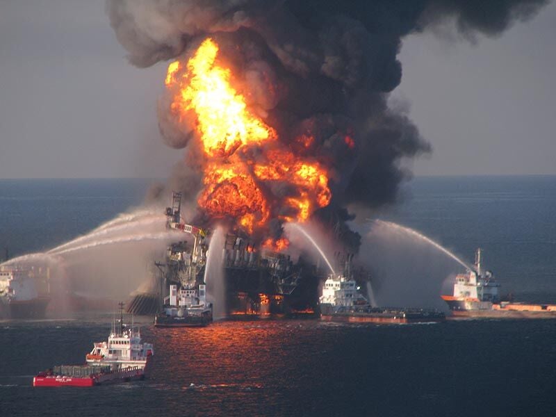 Fire boat response crews battle the blazing remnants of the offshore oil rig Deepwater Horizon.