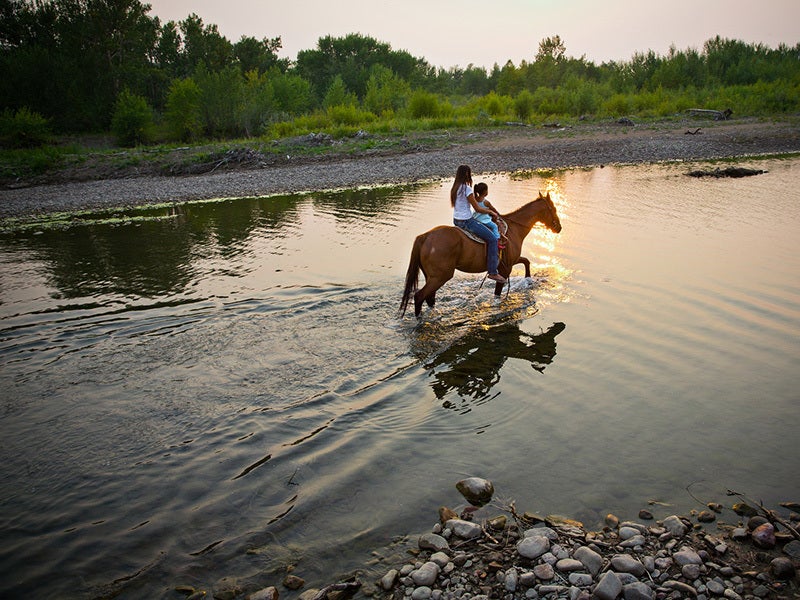 Kendall Edmo with her daughter, in the sacred Badger-Two Medicine area. A Blackfeet tribal member, Edmo works to protect the Badger-Two Medicine area from oil and gas drilling. Kendall Edmo with her daughter, in the sacred Badger-Two Medicine area. A Blackfeet tribal member, Edmo works to protect the Badger-Two Medicine area from oil and gas drilling.