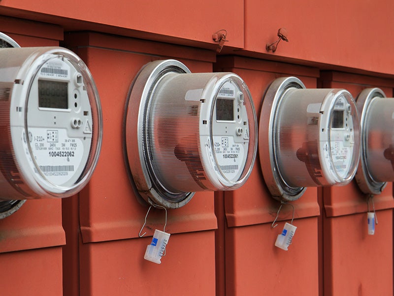 A row of electrical meters. A row of electrical meters.
