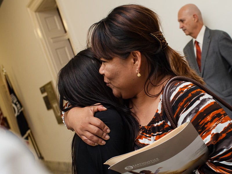 Ana Alicia Torres Aguirre hugs Earthjustice attorney Andrea Delgado. Ana Alicia Torres Aguirre hugs Earthjustice attorney Andrea Delgado.