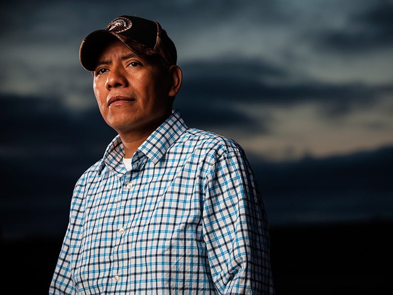 Pedro Reyes teaches English to farmworkers to help improve farmworker protection standards. Pedro Reyes teaches English to farmworkers to help improve farmworker protection standards.
