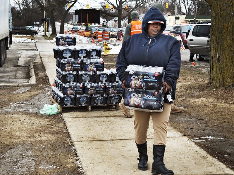 Bottled water distribution by National Guard at Fire Station 6, in downtown Flint, Michigan, on January 23, 2016. Bottled water distribution by National Guard at Fire Station 6, in downtown Flint, Michigan, on January 23, 2016.