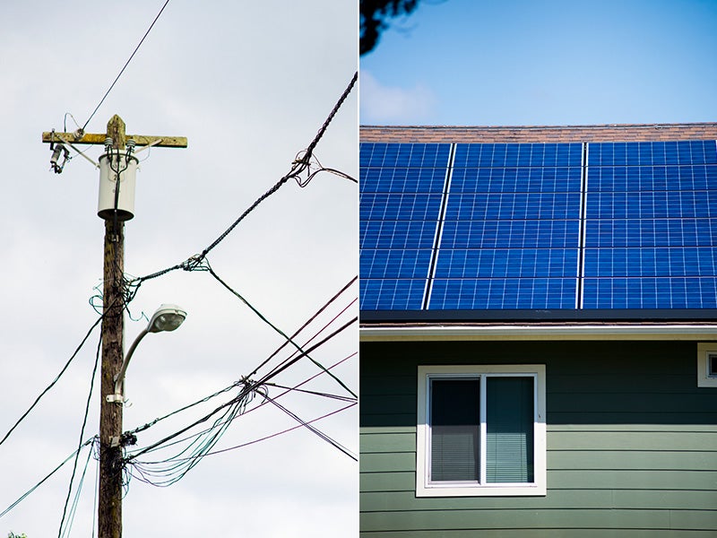 Powerlines and rooftop solar panels in Oahu, Hawaii. Powerlines and rooftop solar panels in Oahu, Hawaii.