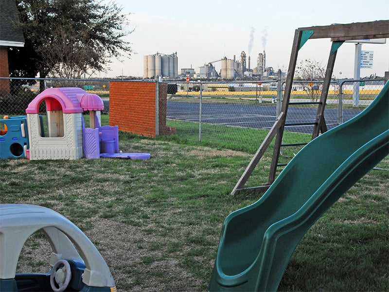An industrial incinerator frames a church playground in Midlothian, Texas. An industrial incinerator frames a church playground in Midlothian, Texas.