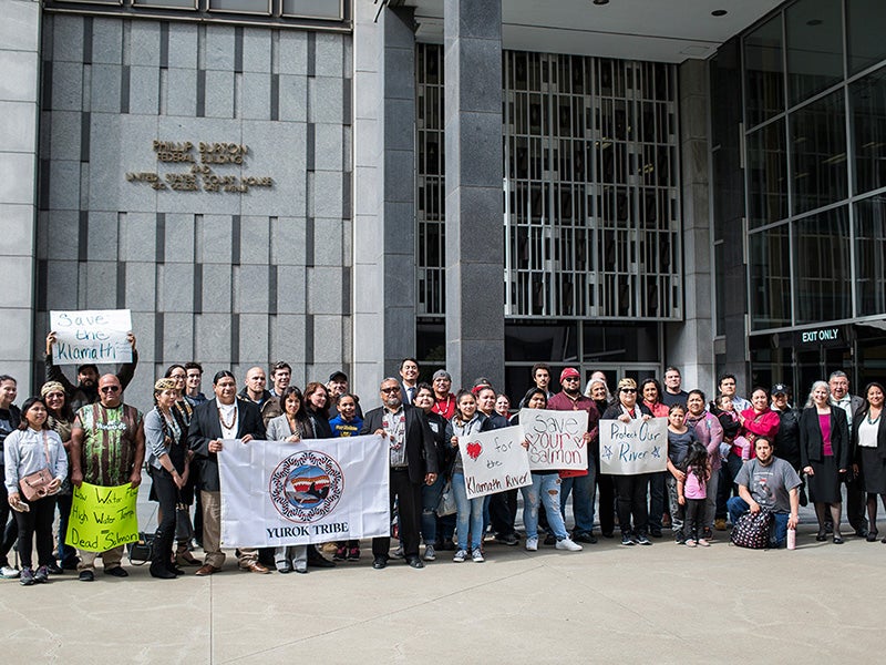 Members of the Yurok Tribe and Earthjustice gather outside a San Francisco courthouse in 2018. Members of the Yurok Tribe and Earthjustice gather outside a San Francisco courthouse in 2018.