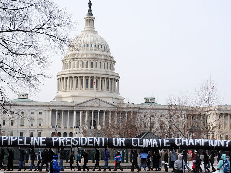 Concerned members of the public from 350.org and other organizations carry a 200-yard inflatable pipeline around the Capitol Building in 2014, demanding that the President Obama reject the Keystone XL tar sands pipeline. Concerned members of the public from 350.org and other organizations carry a 200-yard inflatable pipeline around the Capitol Building in 2014, demanding that the President Obama reject the Keystone XL tar sands pipeline.