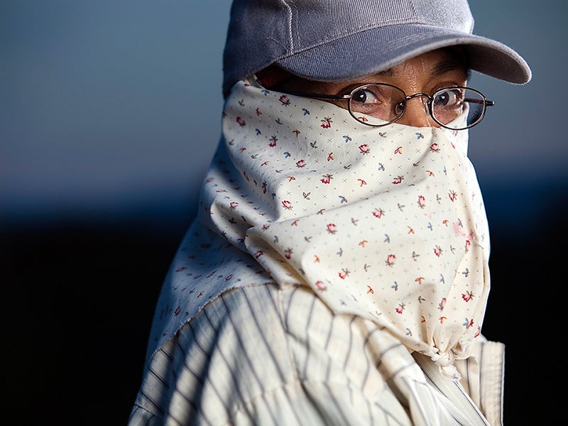 Maria Aguilera, a farmworker for 24 years, has learned to protect herself from toxic chemicals applied to the fields. Maria Aguilera, a farmworker for 24 years, has learned to protect herself from toxic chemicals applied to the fields.