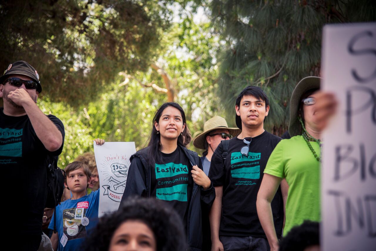Kimberly Amaya, center, marches with other members of East Yard Communities for Environmental Justice. Kimberly Amaya, center, marches with other members of East Yard Communities for Environmental Justice.