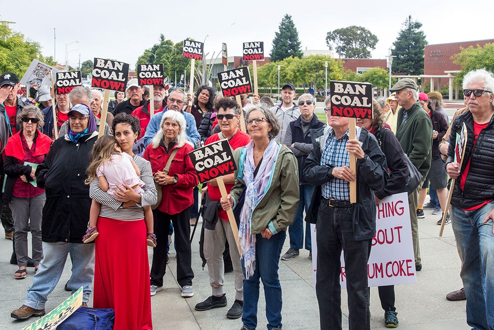Richmond residents rally against coal at the Richmond City Hall in 2019.