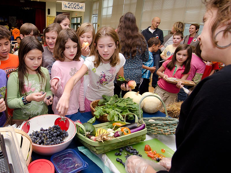 A school lunch event in Arlington, VA, teaches children about nutrition. 