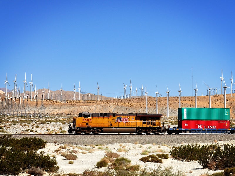 A cargo train passes the windmills outside of Palm Springs, Calif. A cargo train passes the windmills outside of Palm Springs, Calif.