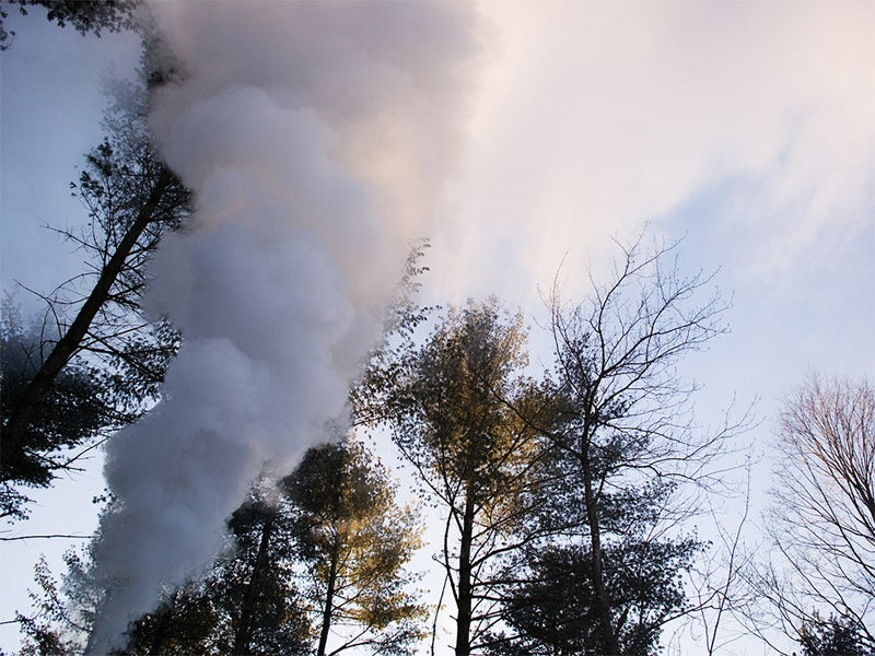 Smoke from a wood boiler. The devices emit high volumes of hazardous air pollutants and carcinogens. Smoke from a wood boiler. The devices emit high volumes of hazardous air pollutants and carcinogens.