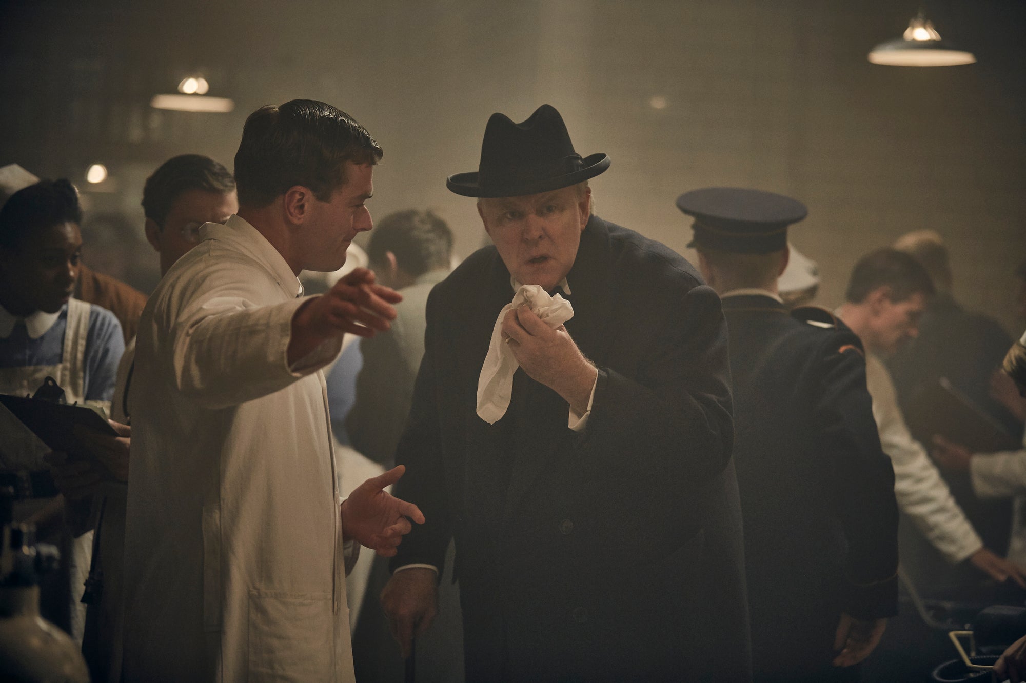 John Lithgow, center, plays Winston Churchill in the series "The Crown."