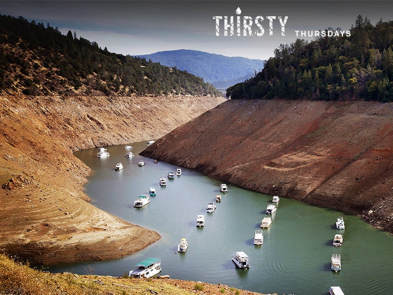 Houseboats sit in the drought lowered waters of Oroville Lake, near Oroville, California on October 30, 2014.