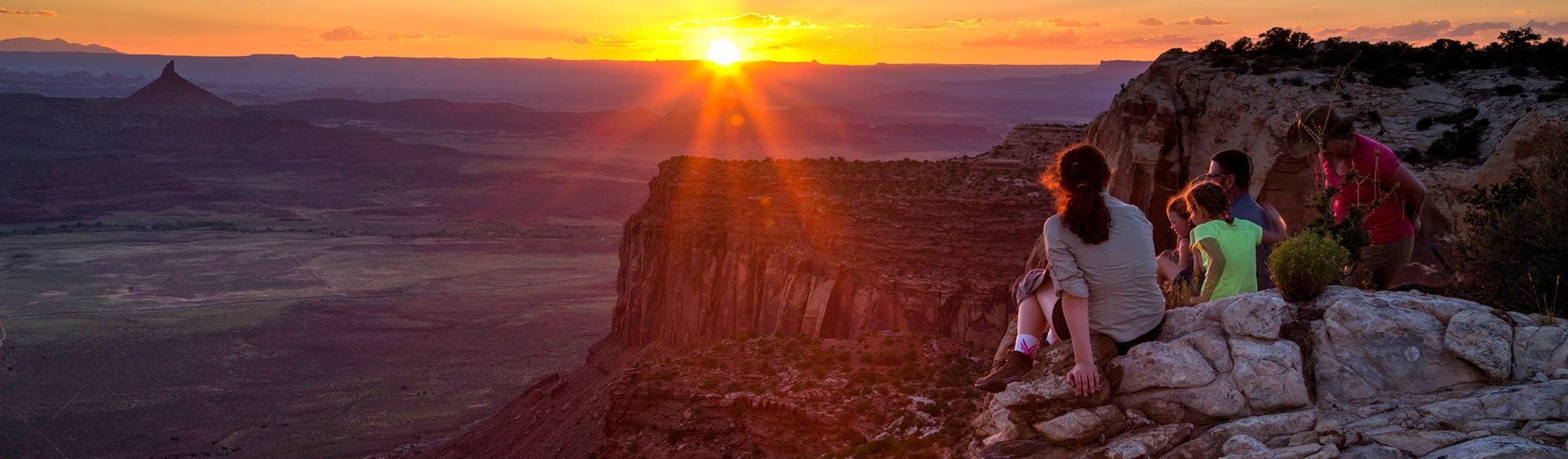 Visitors watch the sun set at Bears Ears National Monument. Visitors watch the sun set at Bears Ears National Monument.