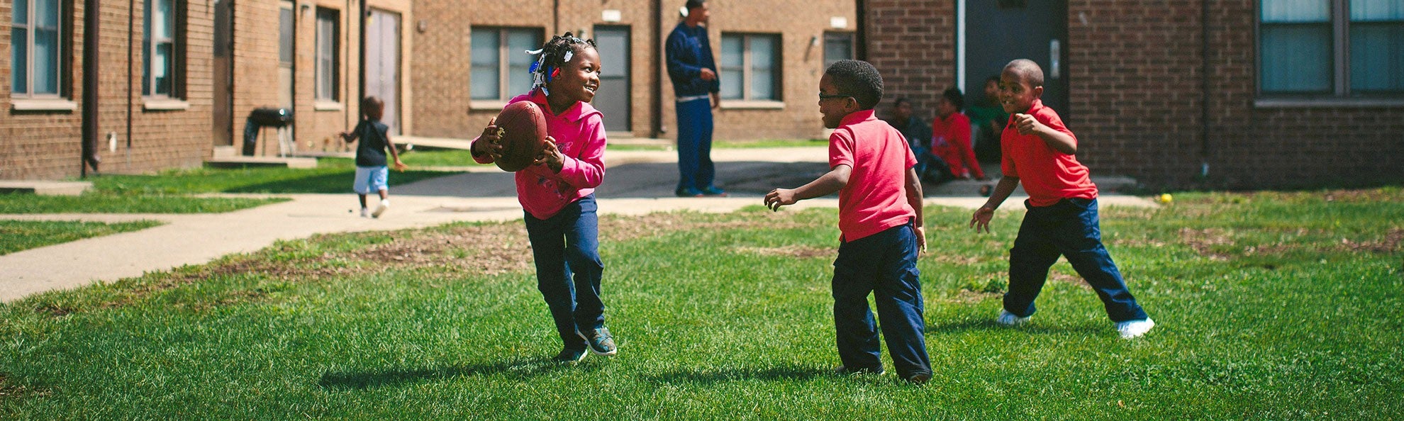 Children play at the West Calumet Housing Complex in East Chicago, Ind., in 2016. Children play at the West Calumet Housing Complex in East Chicago, Ind., in 2016.