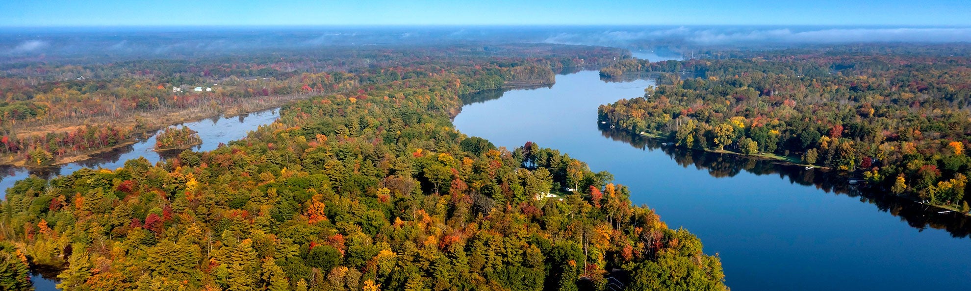 The Menominee River flows along the border of Wisconsin and the upper peninsula of Michigan. The Menominee River flows along the border of Wisconsin and the upper peninsula of Michigan.