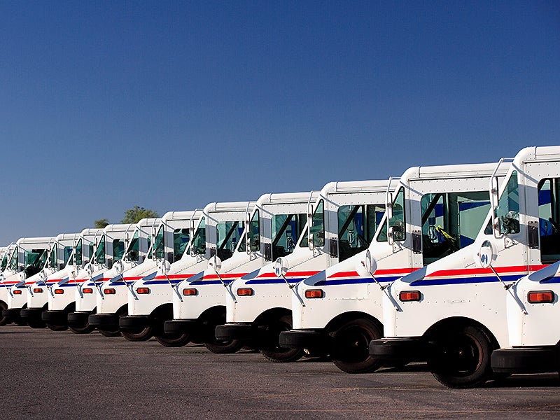 USPS mail trucks make up more than 30% of the federal government’s vehicles.
(Brian Brown / Getty Images)