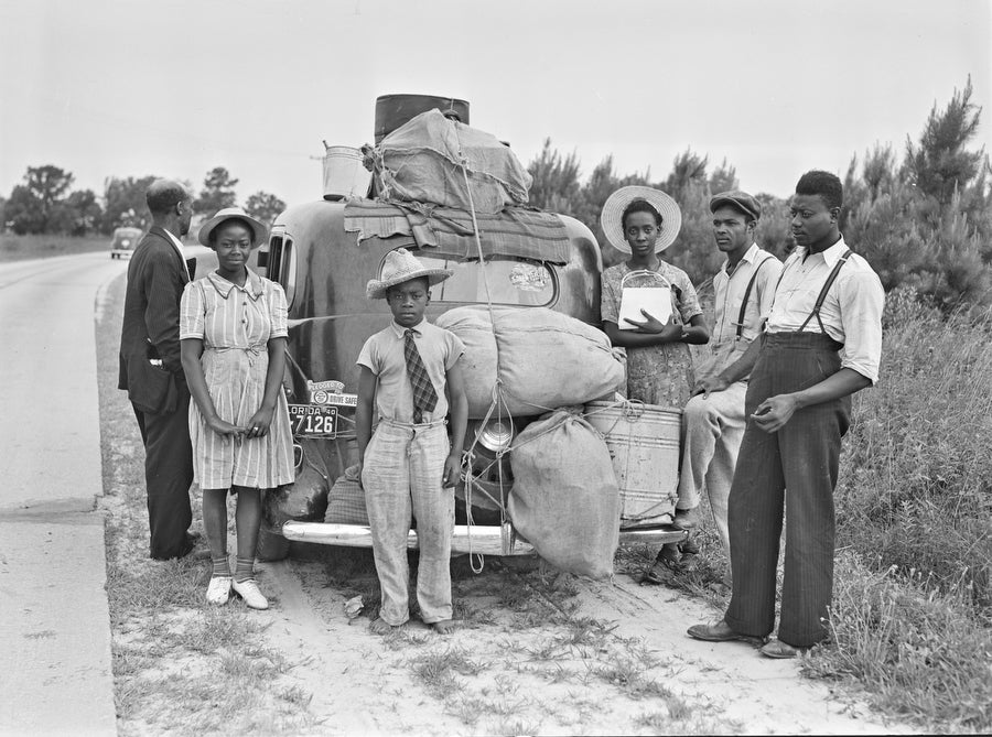 Farm workers from Florida, photographed near Shawboro, N.C., on their way to pick potatoes in Cranberry, N.J., in 1940.