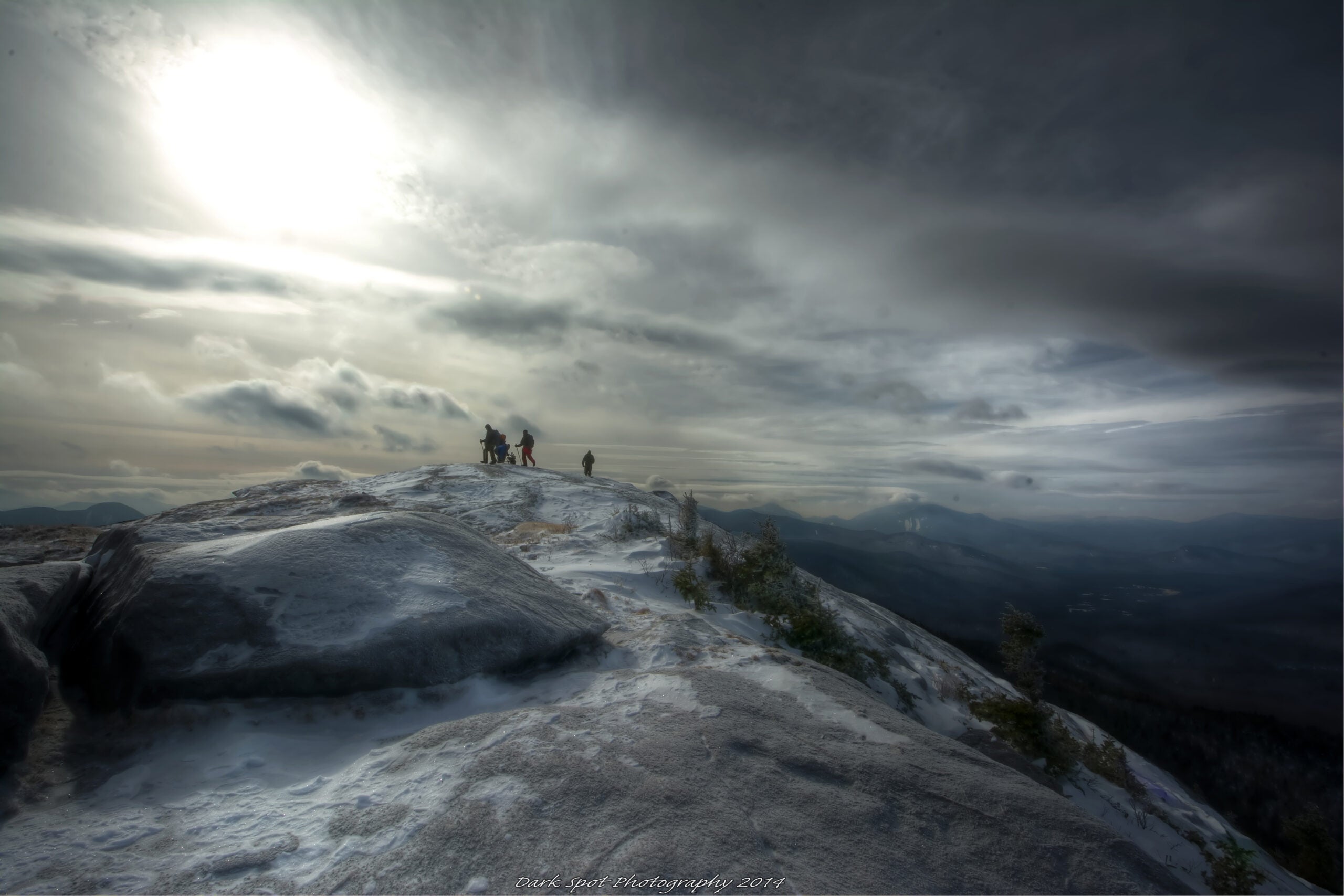 Hikers on the peak of Cascade Mountain in Adirondack Park
