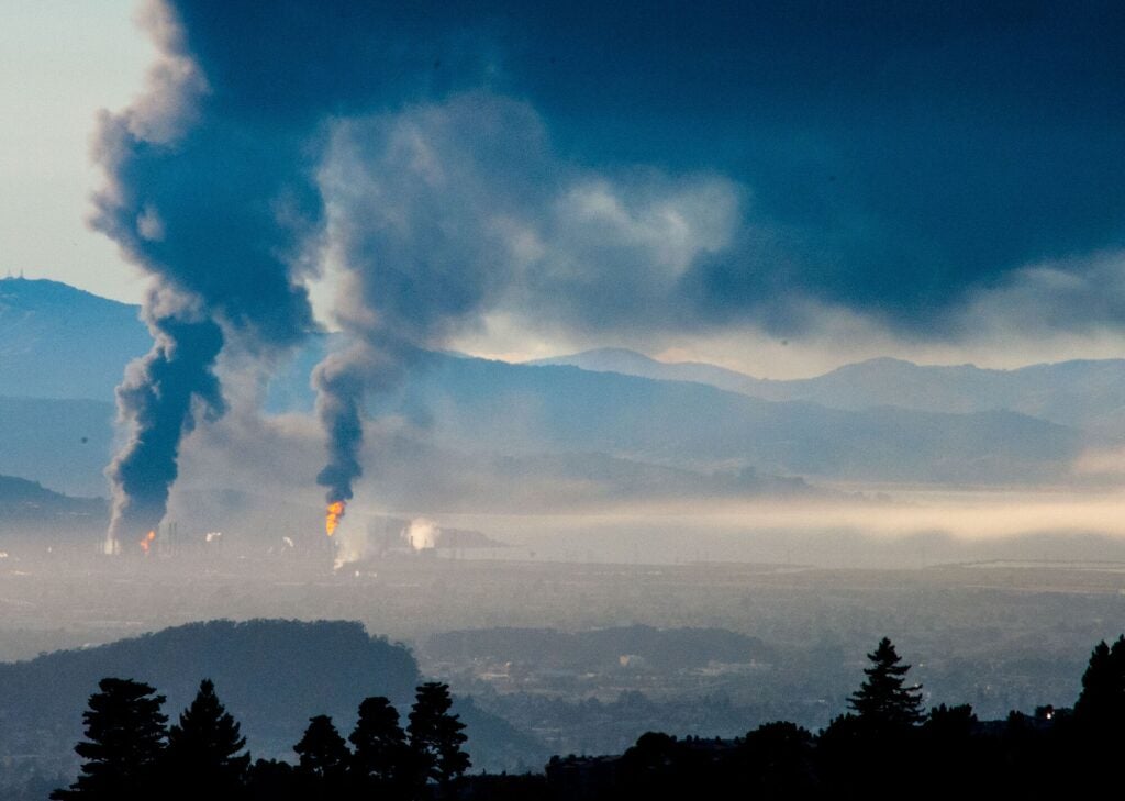 The massive fire at the Chevron oil refinery in Richmond, Calif., on Aug. 5, 2012, billows smoke over the San Francisco Bay Area.