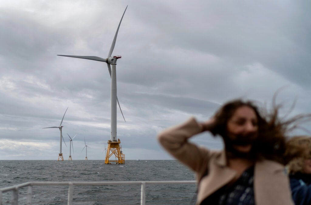 An offshore wind farm like this one in Rhode Island will soon help power New York City, replacing the need for new fossil fuel projects. (David Goldman / AP)