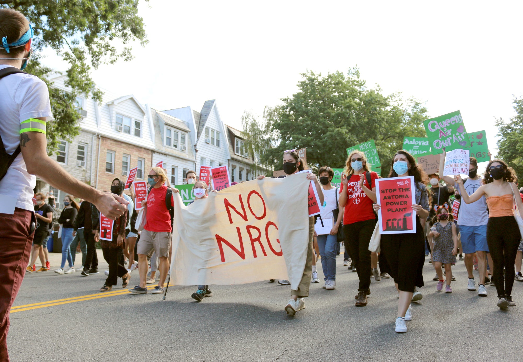 Activists march through Queens, New York, protesting NRG Energy’s proposed gas-fired power plant.