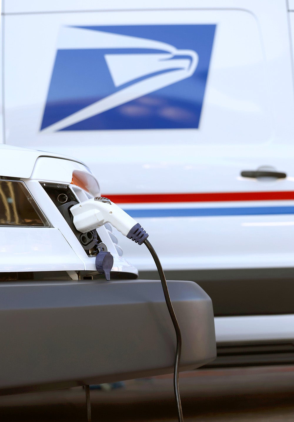 Electric United States Postal Service trucks on display at the Postal Service Headquarters on December 20, 2022 in Washington, DC.