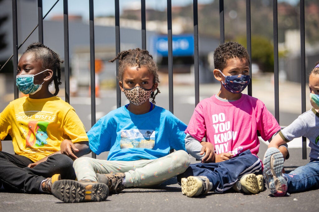 Students from Abundant Beginnings protest in in front of the Chevron Oil Refinery in Richmond on May 21, 2021.