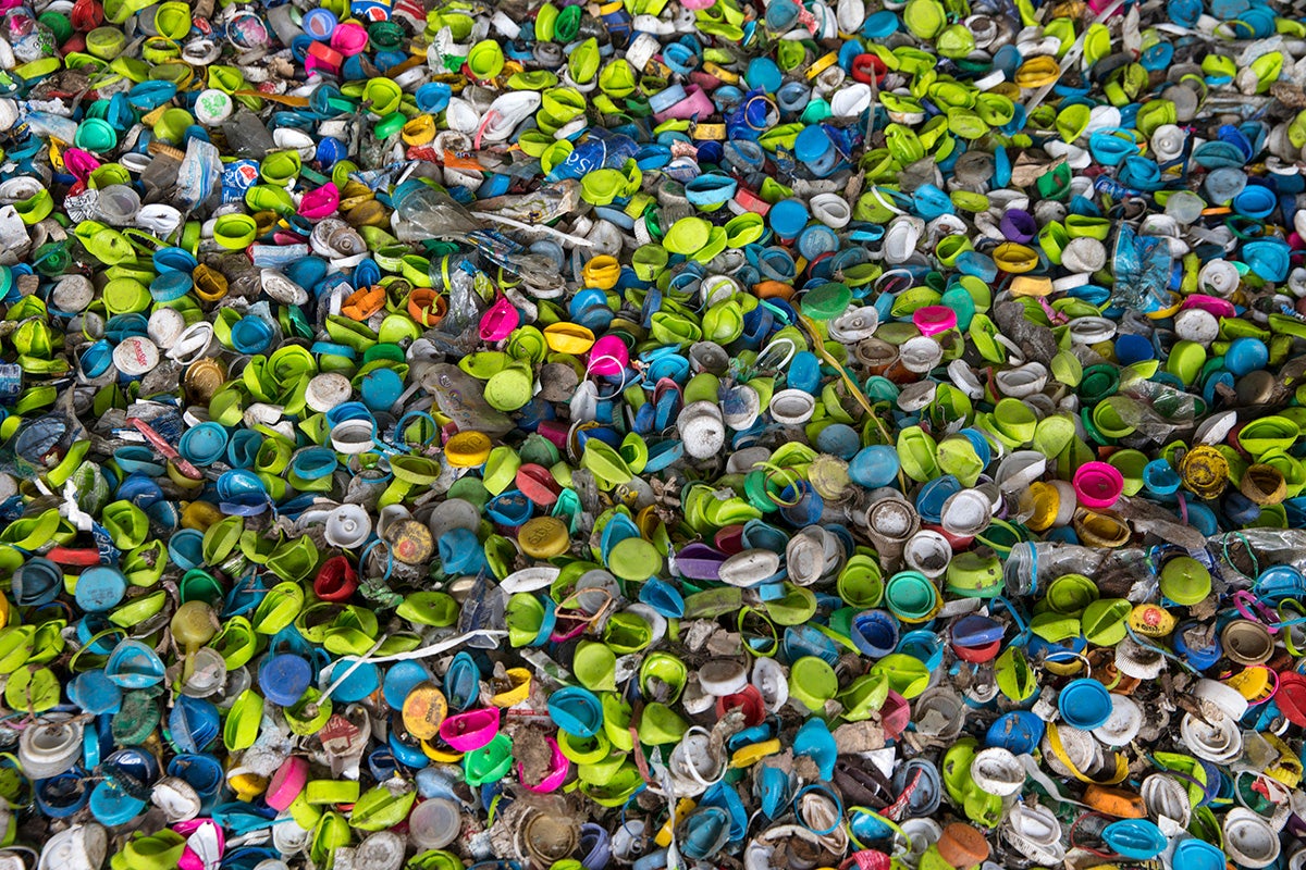 Bottle caps are collected to be sent to a recycling factory for processing in Nakon Pathom, Thailand.
