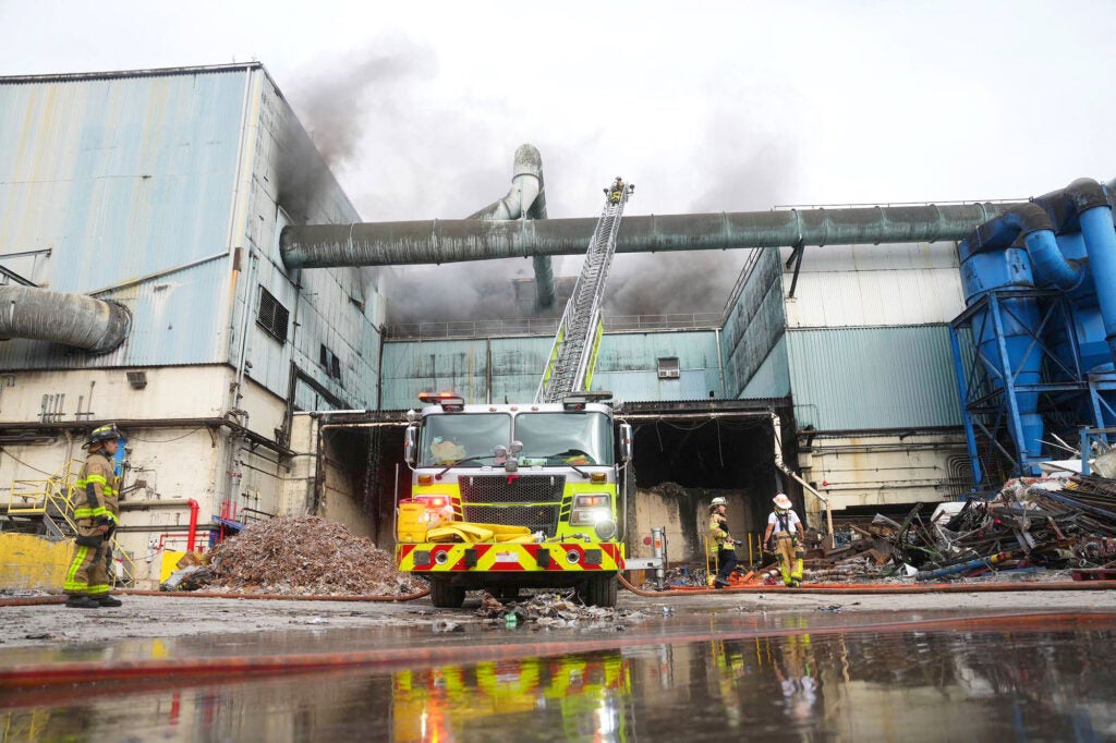 Firefighters work to extinguish a fire at the Covanta Energy incinerator in Miami, which started on Feb. 12, 2023, and burned for nearly 3 weeks. As of Mar. 2023, firefighters had
extinguished the full blaze but left a team on site to suppress any new smoldering. Incinerator staff continue to haul away hundreds of truckloads of waste and debris, and the cause of the fire is still unknown. (Miami-Date Fire Rescue)