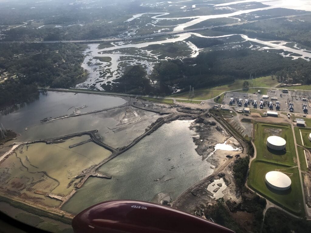 Aerial view of a flooded coal ash pond at Plant McManus days after Hurricane Irma in 2017. Unknown amounts of coal ash spilled into Georgia’s Golden Isles during the storm. (Jen Hilburn)