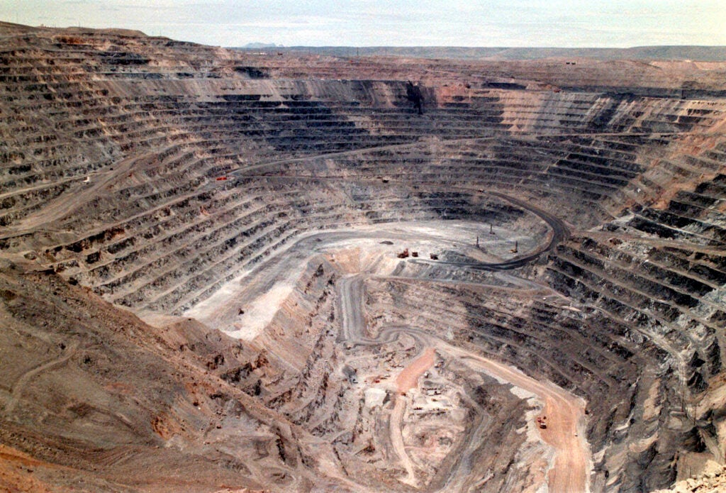A large open pit, all brown and gray.