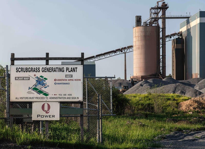 A sign for the Scrubgrass Generating Plant is displayed in front of the facility where coal waste is burned to produce energy for cryptocurrency mining computers.