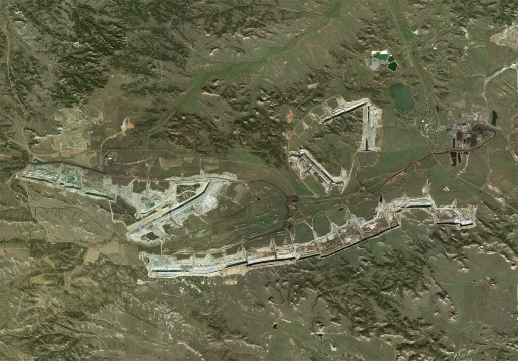 One of the largest coal strip mines in the nation, the Rosebud mine feeds coal directly to the Colstrip coal-fired power plant. <a href="https://www.bing.com/maps?cp=45.861882%7E-106.724514&lvl=14.4&style=a" target="_blank" rel="noopener">(© Maxar / © Microsoft)</a>