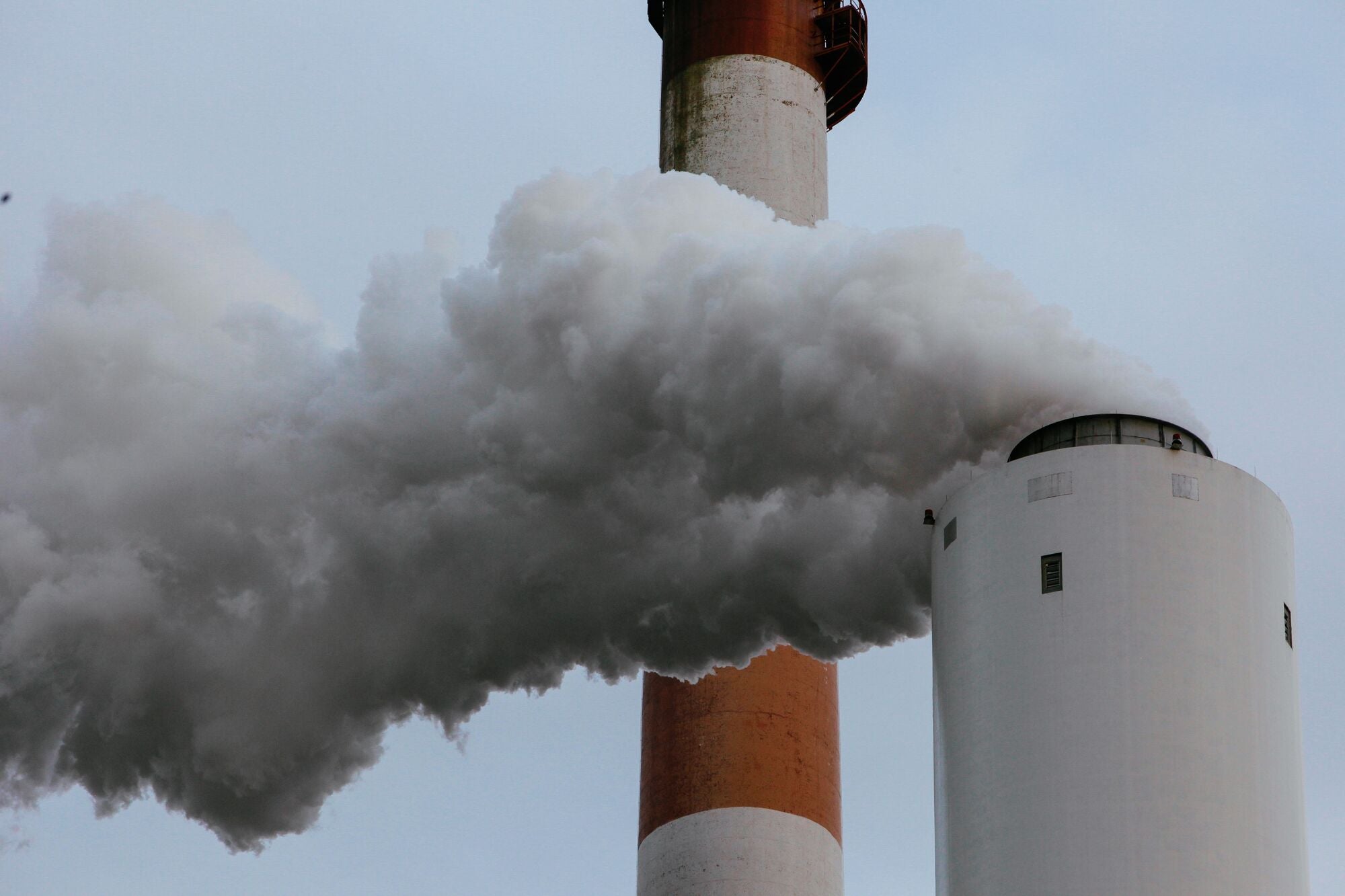 A closeup view of smoke billowing from a smokestack at the Cheswick Generating Station from in Springdale, Penn., in 2010.