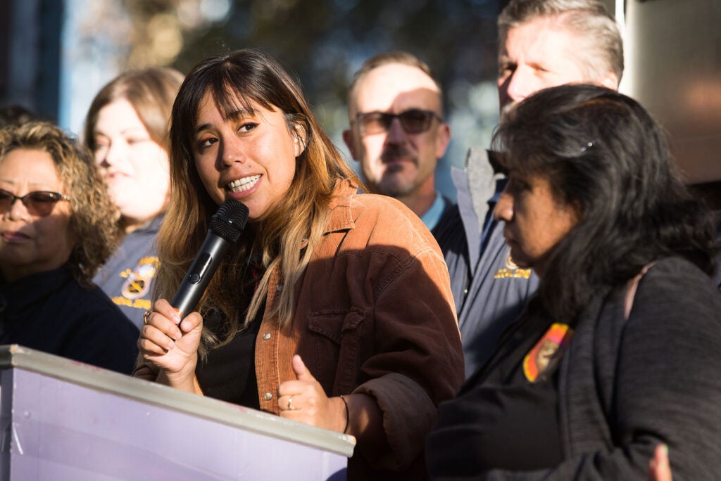 Andrea Vidaurre of the People's Collective for Environmental Justice speaks at a rally before a California Air Resources Board public hearing to consider proposed clean trucks regulation in 2022 in Sacramento Calif. (Chris Jordan-Bloch / Earthjustice)